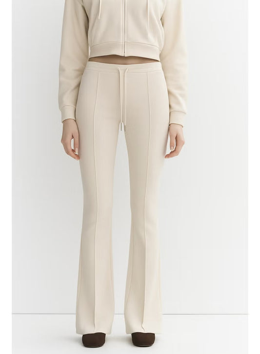 Women's Beige High-Waisted Flared Pants Soft Cotton Interlock | Elegant Fit with Drawstring